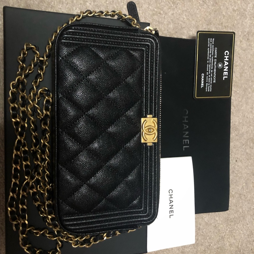 Sold! Authentic Chanel caviar boy wallet on chain